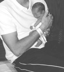 newborn-father-physical-contact-love-2s.jpg